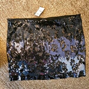 Animal print sequin bodycon mini skirt.